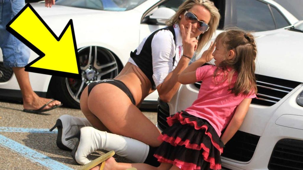 mom posing underwear with daughter by car